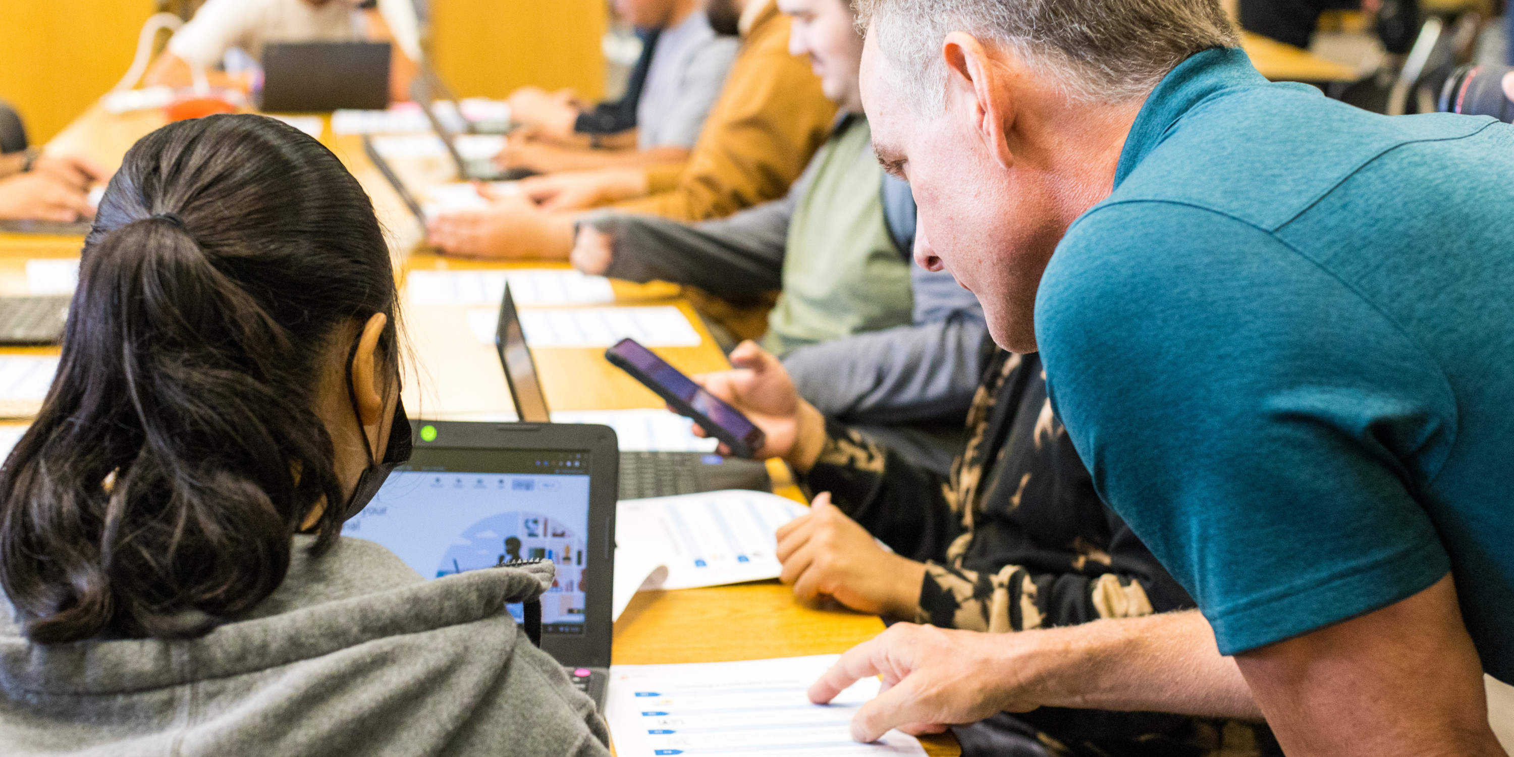Photo of SATX Student workshop, students working on laptops