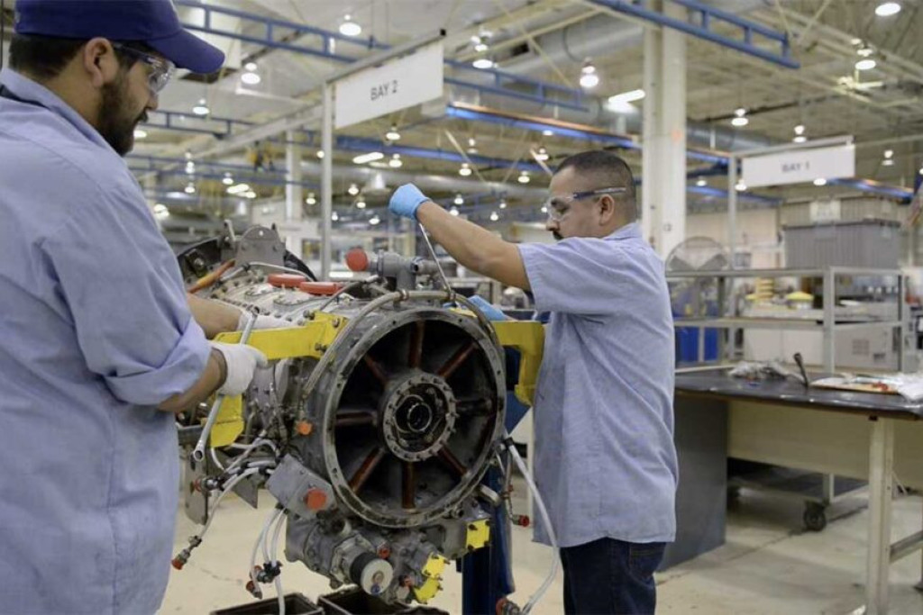 men working on engine