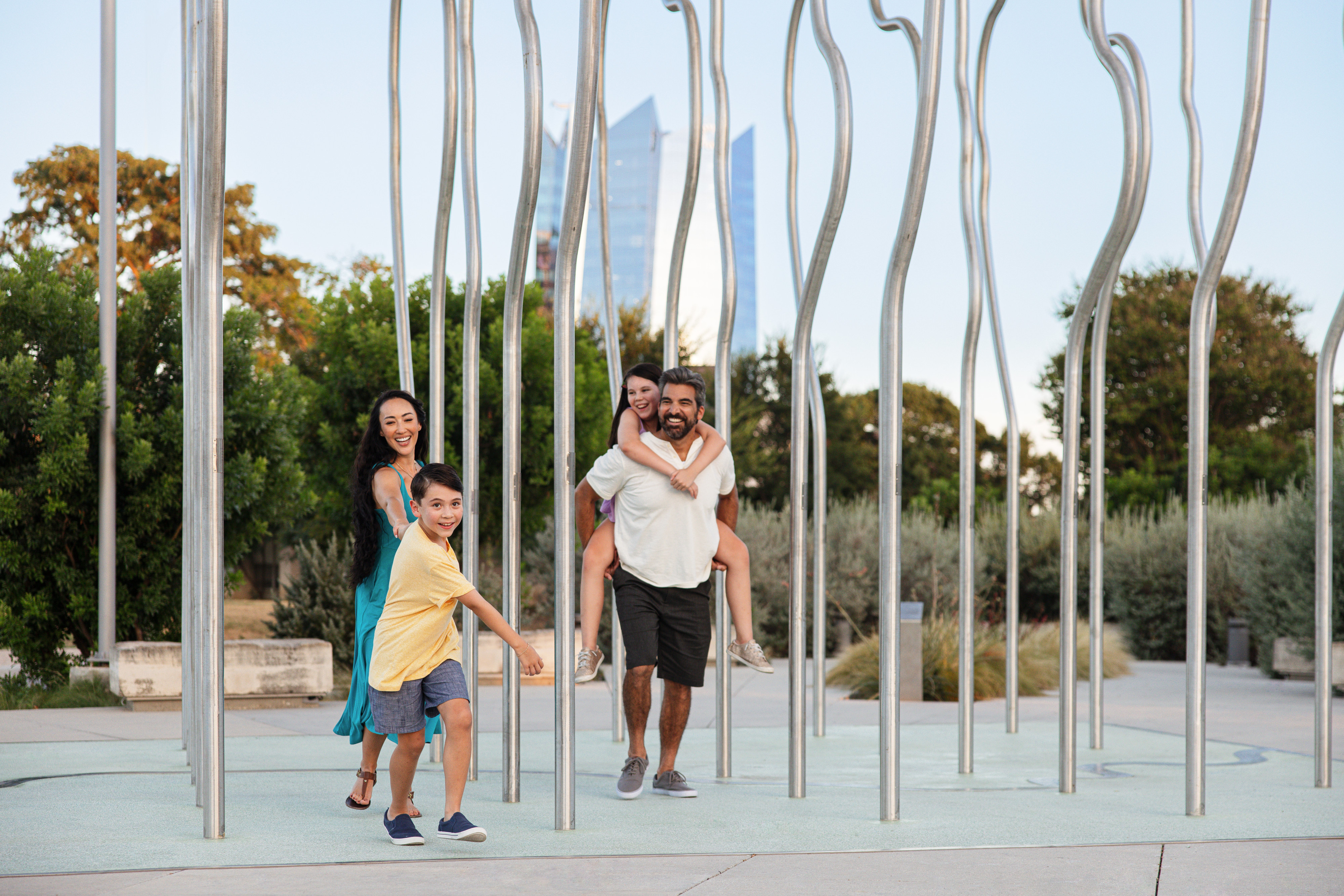 family playing in park